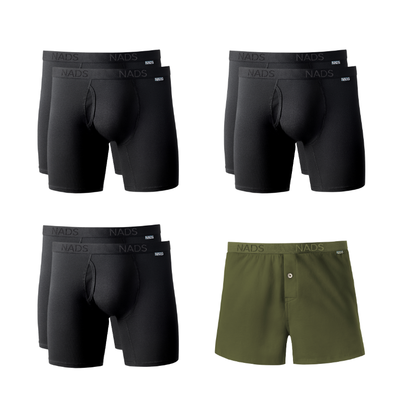 Eight pairs of black boxer briefs and one green shorts with 'NADS' branding on a white background.